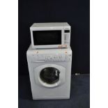 A HOTPOINT AQUARIUS WML540 WASHING MACHINE and a Panasonic Microwave (both PAT pass and working) (