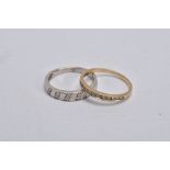 TWO 9CT GOLD DIAMOND RINGS, the first of a half eternity design, set with a row of graduated channel