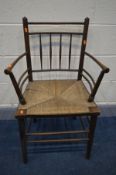 IN THE MANNER OF MORRIS & CO SUFFOLK CHAIR, the back with spindles and horizontal rails, open arm