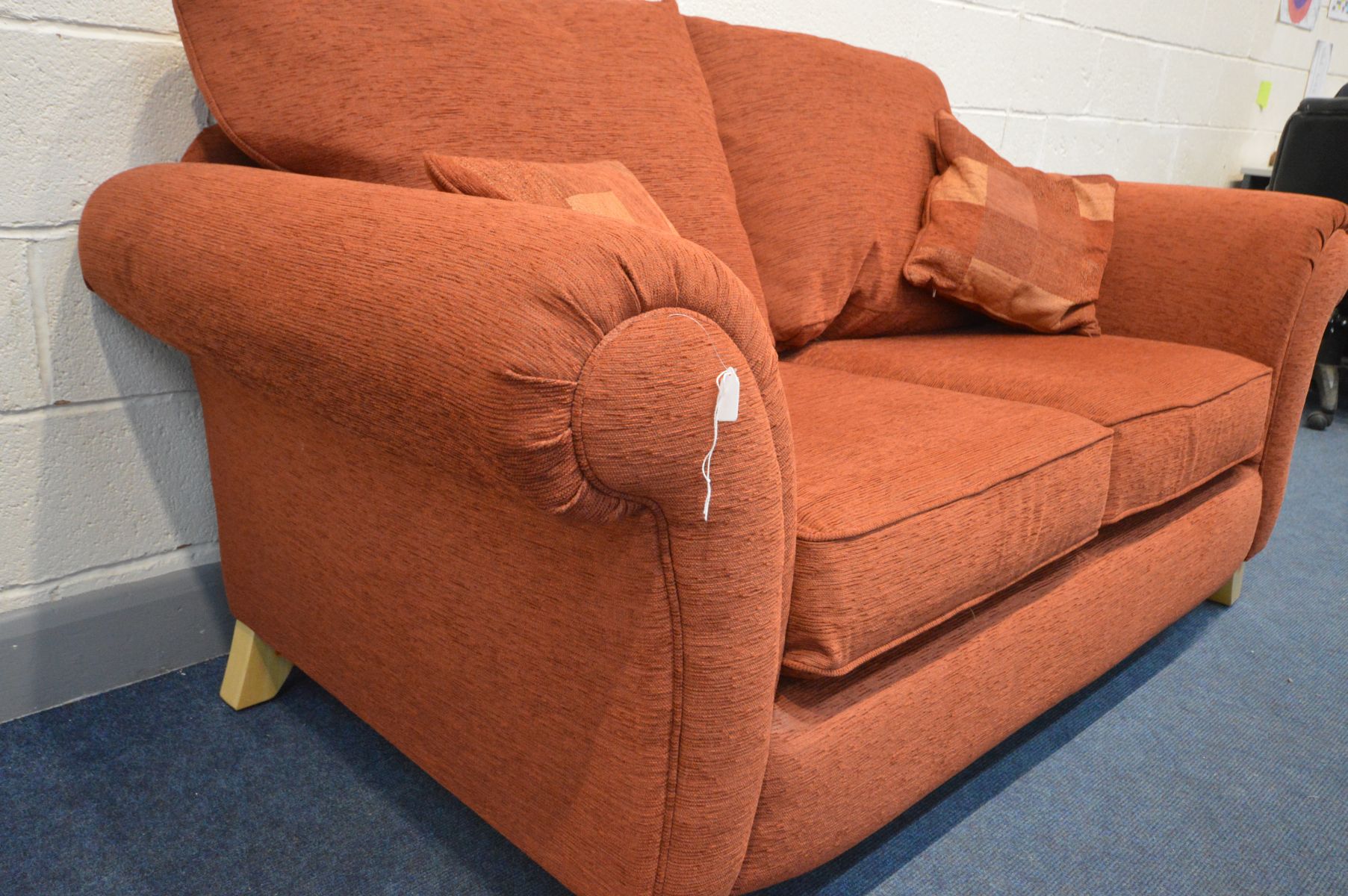 A BURNT ORANGE SETTEE, inner width 120cm, on splayed feet - Image 2 of 3