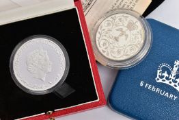 A BOXED SILVER PROOF QUEENS 90TH BIRTHDAY ONE OUNCE, to include a Queens Jubilee silver crown 1977
