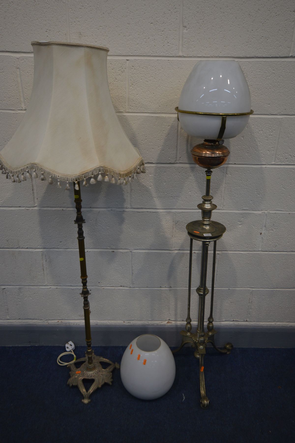A TELESCOPIC OIL LAMP, white glass shade, brass reservoir, min height 133cm x max height 198cm, with