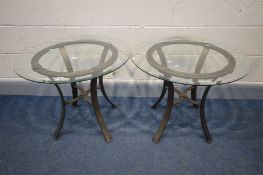 A PAIR OF MODERN METAL OCCASIONAL TABLES, with circular bevelled glass tops, diameter 66cm x