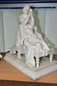 A VICTORIAN MINTON PARIAN FIGURE GROUP OF A MOTHER PRAYING OVER HER SLEEPING CHILD, on a rectangular