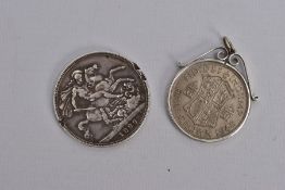 TWO SILVER COINS, the first a mounted George VI 1948 half crown, within a collet and scroll mount,