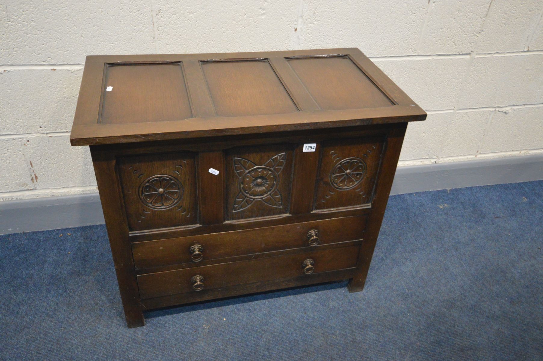 AN OAK PANELLED BLANKET CHEST, with two drawers, width 82cm x depth 45cm x height 69cm