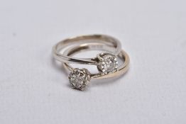 TWO DIAMOND RINGS, the first a white gold ring, designed with a raised illusion set, round brilliant