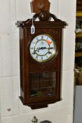 A GROUP OF CLOCKS AND A BAROMETER, to include 'The Time MFG-Co' wall clock, Roman numerals, with