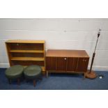 A TEAK DOUBLE BI-FOLD RECORD CABINET on square tapering legs, a teak three tier bookcase with