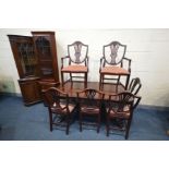 A STAG MAHOGANY DINING SUITE, comprising an extending twin pedestal table, extended length 214cm x