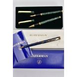 A CASED 'WATERMAN' AND ANOTHER CASED TWO-PIECE PEN SET, the 'Waterman' ballpoint pen with a blue