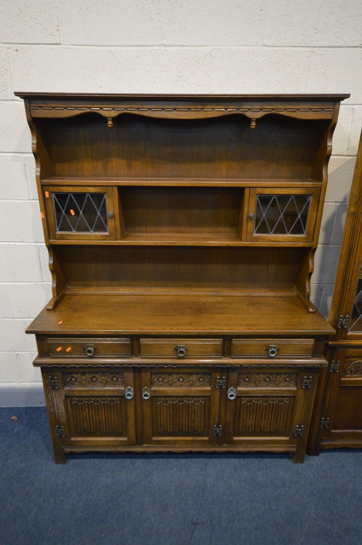 AN OAK OLD CHARM DRESSER, width 136cm x depth 44cm x height 176cm and two door lead glazed corner - Image 3 of 3