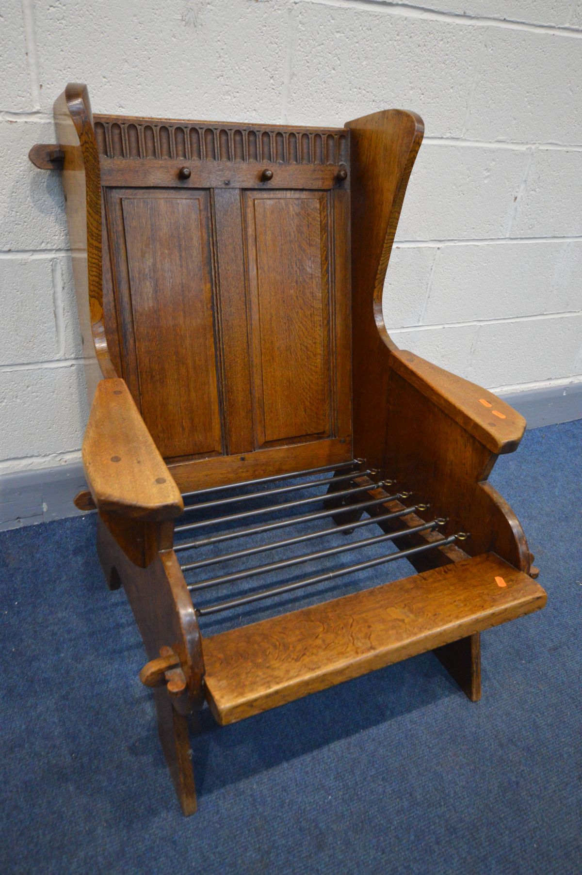 AN ARTS AND CRAFTS OAK ARMCHAIR, with open peg joints, and later cushions, width 73cm x inner seat - Image 3 of 4