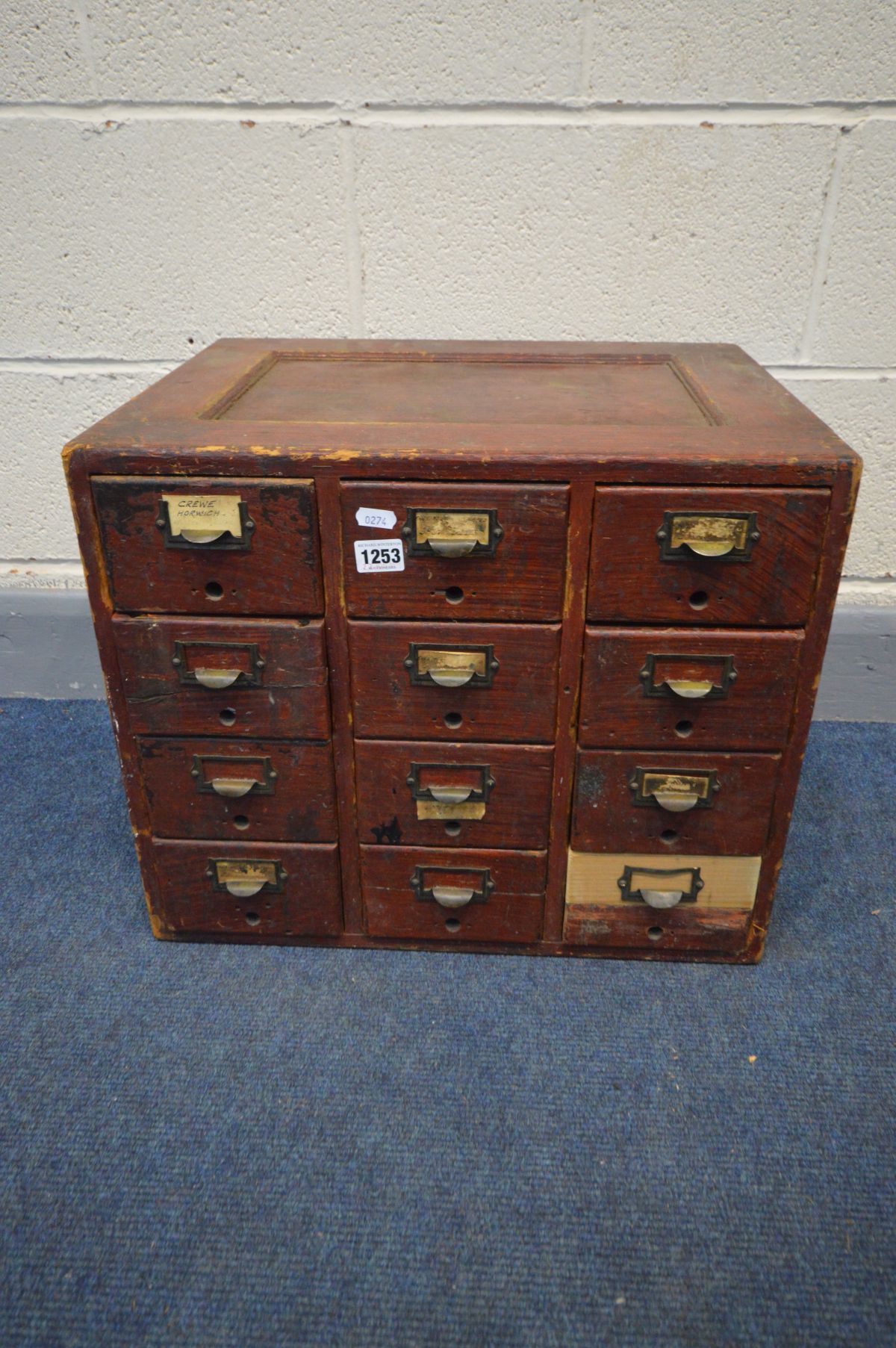 A VINTAGE STAINED PINE TWELVE DRAWER INDEX CABINET, width 51cm x depth 40cm x height 43cm (repair to - Image 2 of 2