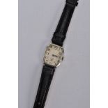 A GENTS EARLY 20TH CENTURY SILVER WRISTWATCH, AF watch with a rectangular engine turned silver