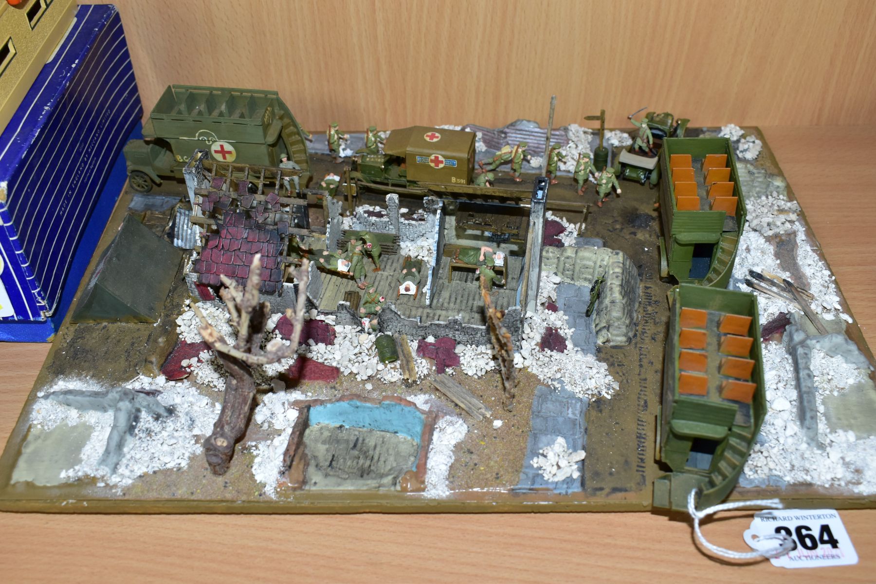 A DIORAMA OF A WWI FIELD HOSPITAL, approximately 1/76 scale, of wooden and plastic construction on a