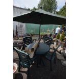 A KETTLER GREEN PLASTIC CIRCULAR GARDEN TABLE, diameter 100cm x height 73cm, three armchairs,