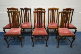 A SET OF EIGHT EARLY 20TH CENTURY STAINED BEECH DINING CHAIRS, with pierced quatrefoil to central