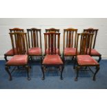 A SET OF EIGHT EARLY 20TH CENTURY STAINED BEECH DINING CHAIRS, with pierced quatrefoil to central