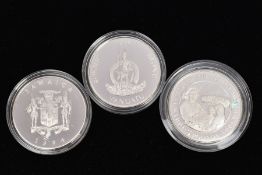 A PACKET CONTAINING SILVER PROOF CROWN SIZE COINS to include a 1995 Queen Elizabeth The Queen Mother