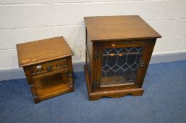 AN OAK OLD CHARM LAMP TABLE with a single drawer together with an oak Old Charm oak hifi cabinet,