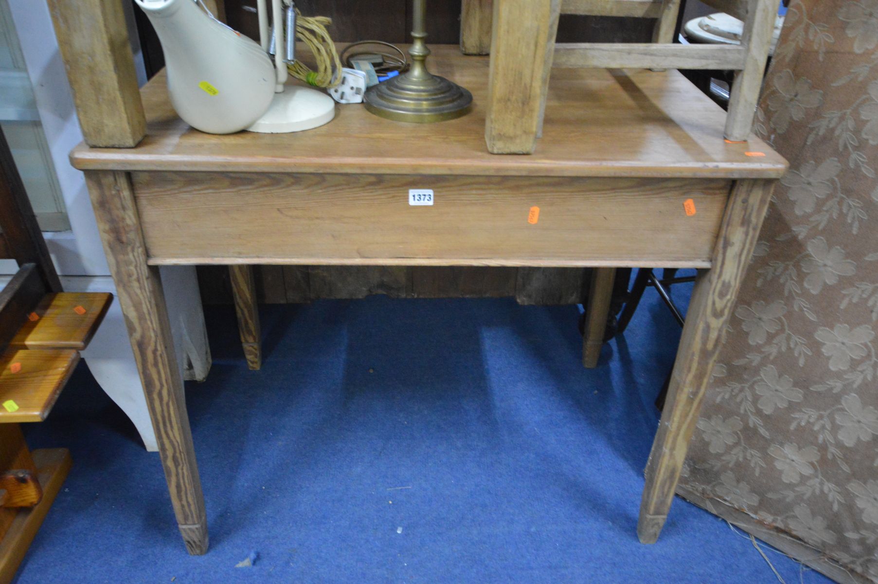 A PITCH PINE TABLE with a single drawer, on square tapering legs, length 91cm x depth 61cm x