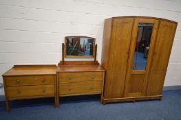 AN EARLY TO MID 20TH CENTURY OAK THREE PIECE BEDROOM SUITE, comprising a two door wardrobe with a