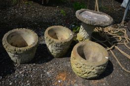 A SMALL COMPOSITE BIRD BATH, along with a pair of brick effect garden planter and another planter (