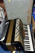 A CASED HOHNER VIRTUOLA III 'PIANO ACCORDION', in black finish with 120 bass and 5 treble couplers