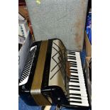 A CASED HOHNER VIRTUOLA III 'PIANO ACCORDION', in black finish with 120 bass and 5 treble couplers