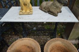 A CAST IRON TABLE, with a later marble top, marked to both legs 'Geo Reid, Leeds' length 122cm x