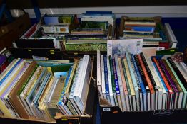BOOKS, a collection of approximately 125 titles in five boxes, the majority consisting of