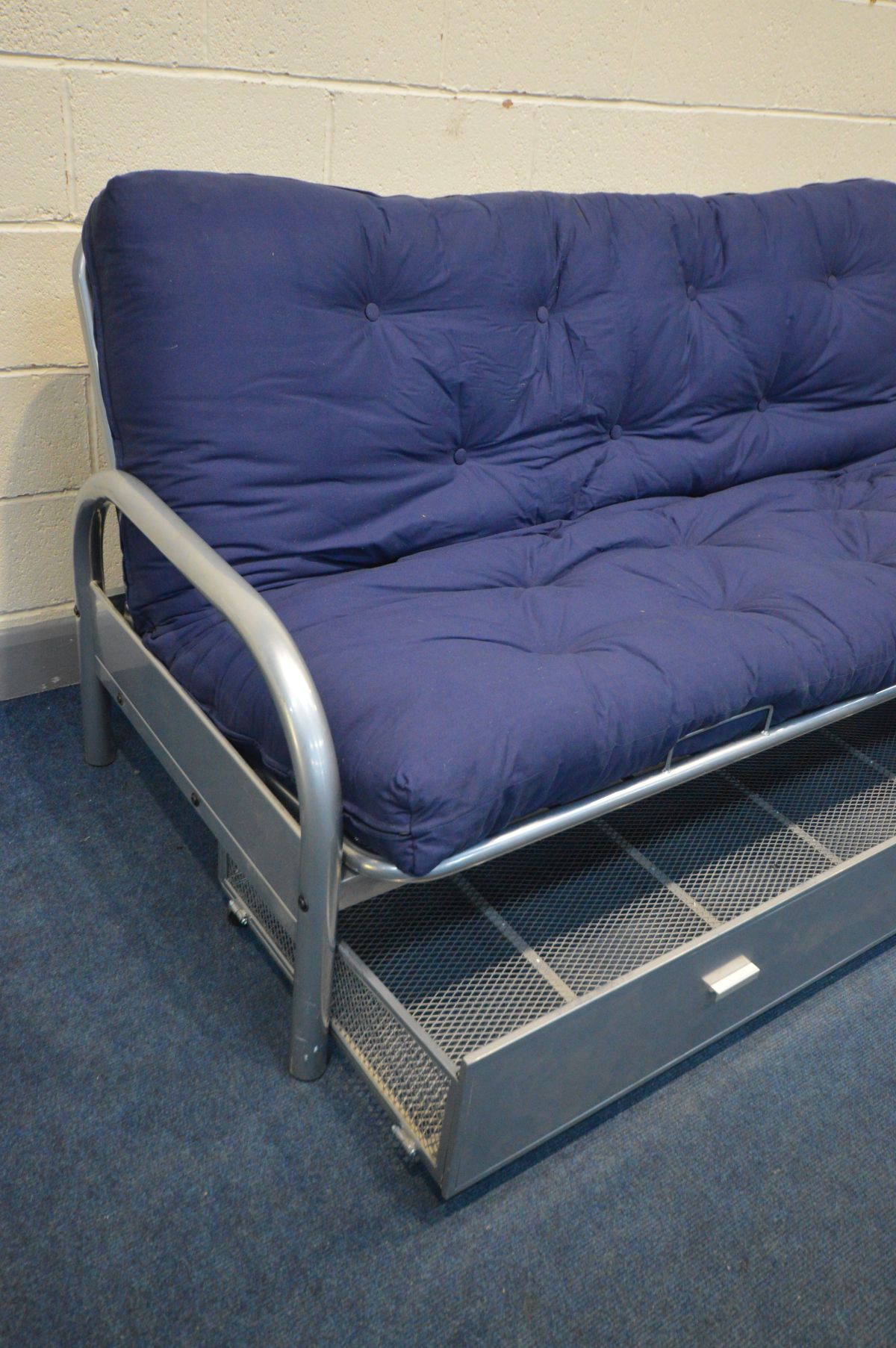 A METAL FRAMED BED SETTEE, with a separate blue cushions and one long drawer - Image 3 of 3