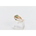 A 9CT GOLD EMERALD AND DIAMOND RING, centring on a circular cut emerald, within single cut diamond