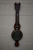 AN EDWARDIAN AND INLAID WHEEL BAROMETER, the brass dial signed D Arnoldi of Gloucester (Sd to