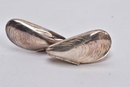 A PAIR OF WHITE METAL MUSSEL EATERS, each in the form of hinged mussel shells, no stamps or marks,