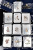 A GROUP OF BEATRIX POTTER THEMED INGOT SET of twelve tales from Jemima Puddleduck through to Miss
