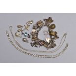 A SILVER CHARM BRACELET, LOOSE CHARMS AND TWO WHITE METAL CHAINS, the charm bracelet fitted with a