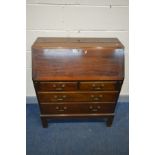 A GORDON RUSSELL OF BROADWAY MAHOGANY BUREAU, with a fall front door enclosing a fitted interior,