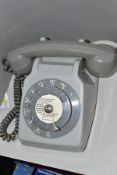 A MID 20TH CENTURY FRENCH GREY DIAL TELEPHONE, missing cable (Condition Report:- worn and used)