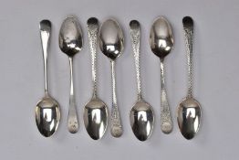 SEVEN SILVER TEASPOONS, four Georgian spoons with an engraved design to the handles and an