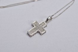 A 9CT WHITE GOLD DIAMOND SET PENDANT NECKLACE, the pendant in the form of a cross, set with single