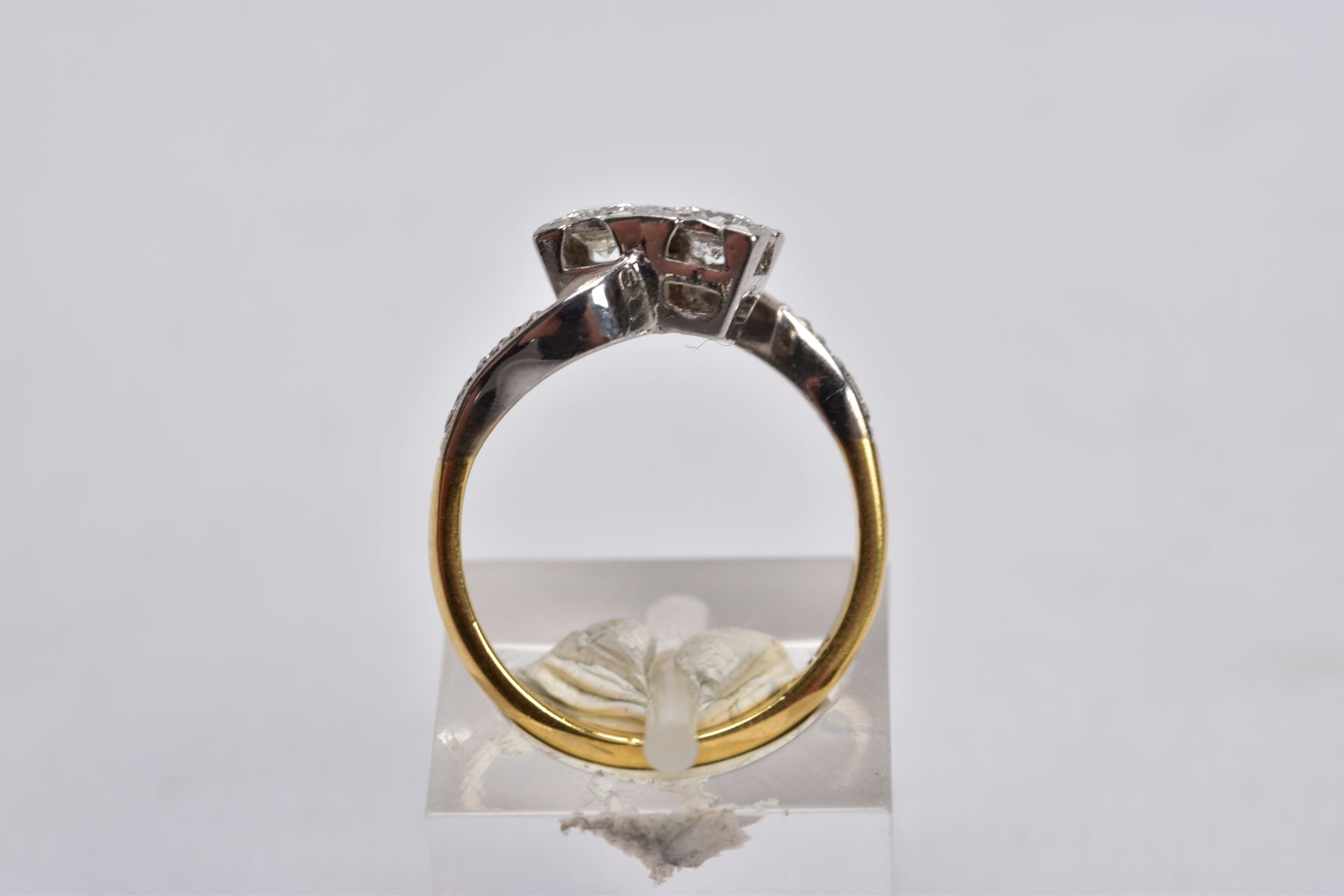 AN 18CT GOLD DIAMOND CROSS OVER RING, designed with two asymmetrical set round brilliant cut - Image 3 of 6