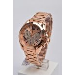 A LADIES ROSE GOLD TONE 'MICHAEL KORS' CHRONOGRAPH WRISTWATCH, round rose gold dial signed '