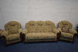 A WOOD AND UPHOLSTERED THREE PIECE SUITE, comprising a sofa, length 192cm and a pair of armchairs (