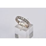 A WHITE METAL DIAMOND HALF ETERNITY RING, designed with a row of ten round brilliant cut diamonds,