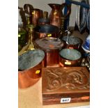 A GROUP OF COPPER AND BRASSWARE, including copper pan and cover, copper pan with brass handle,