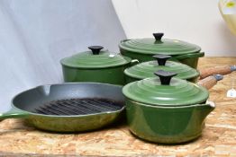 FIVE LE CREUSET GREEN ENAMELLED PANS, comprising a graduated set of three saucepans with lids, 16cm,