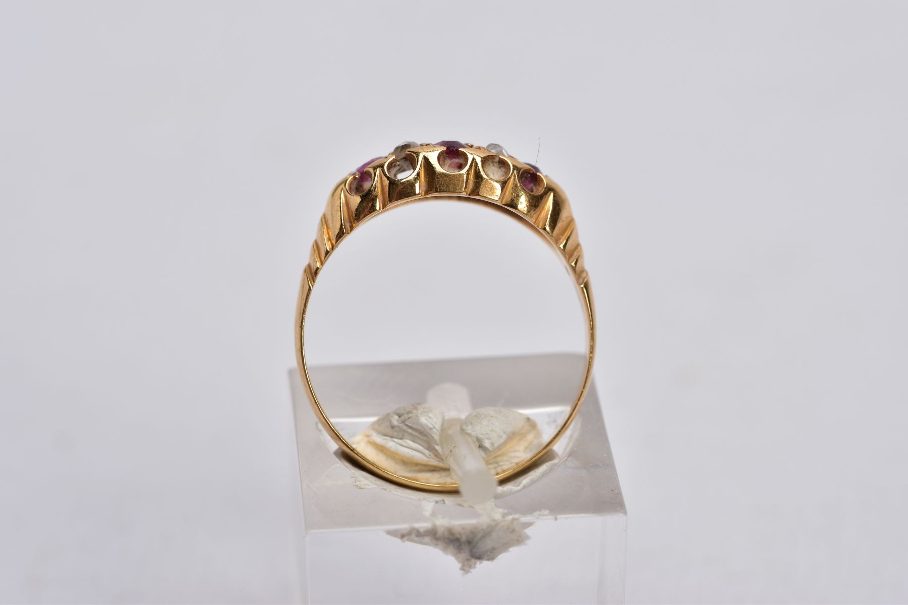 A VICTORIAN DIAMOND AND RUBY BOAT RING, set with four circular cut rubies, interspaced with four - Image 3 of 4