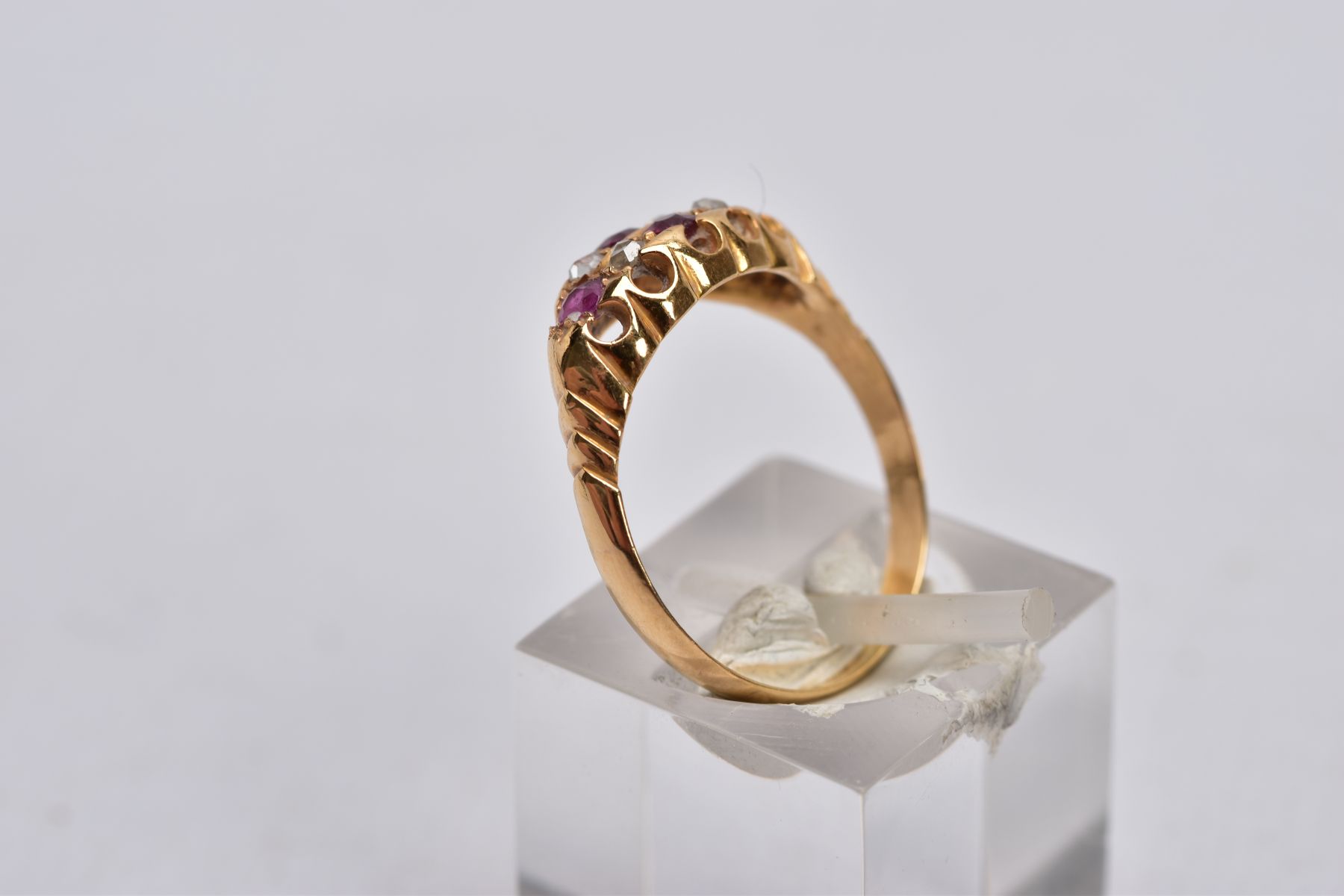 A VICTORIAN DIAMOND AND RUBY BOAT RING, set with four circular cut rubies, interspaced with four - Image 2 of 4